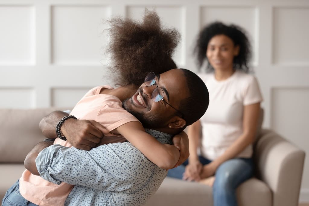 Daughter With Her Smiling Dad