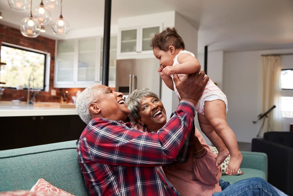 Grandparents Laughing with Their Grandchildren