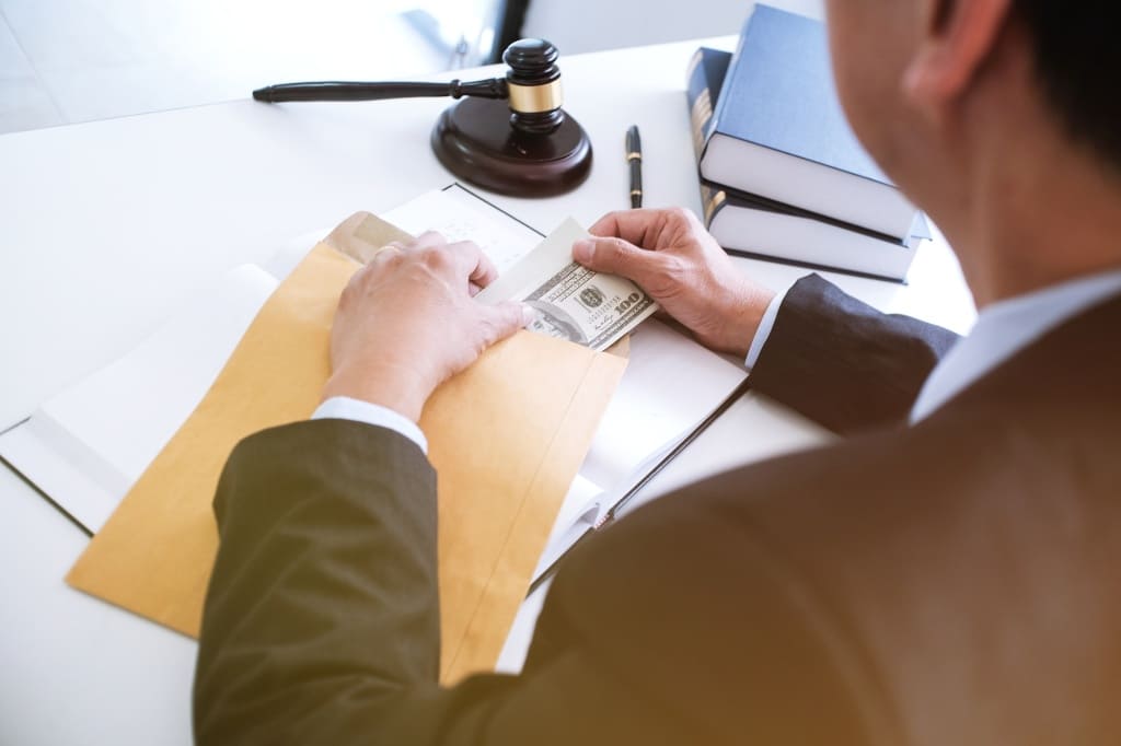 Lawyer Holding Money